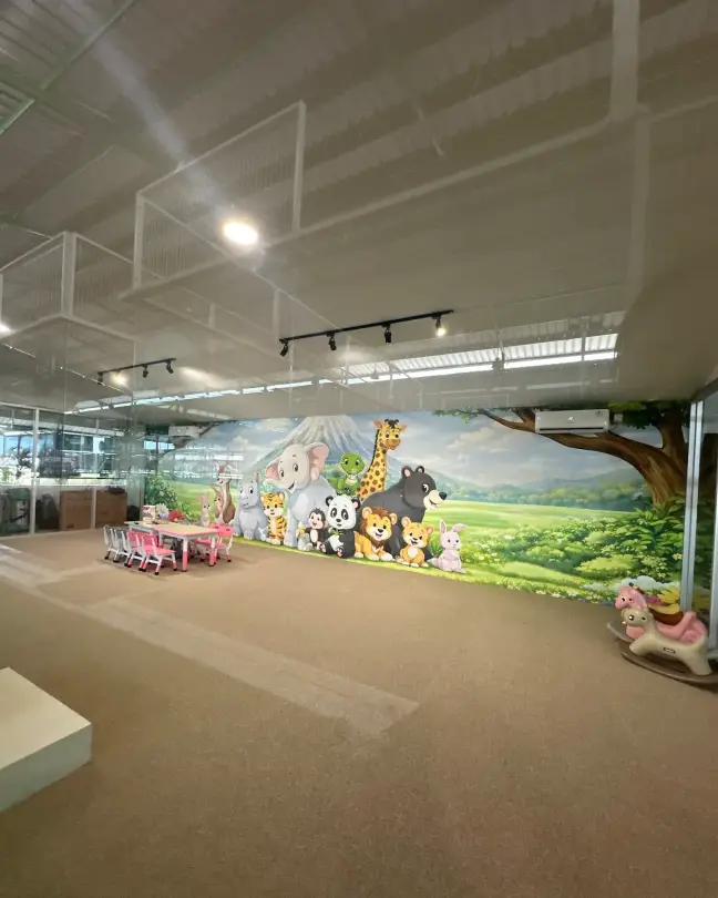 Kids playroom with a jungle mural